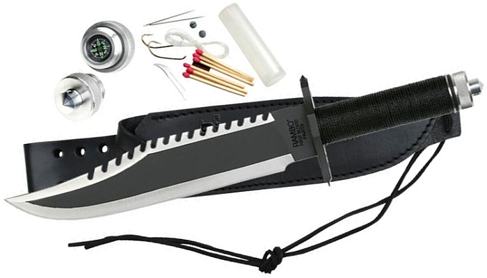 Das Rambo Messer auf der Lederscheide liegen (alles Zubehör mitinbegriffen)